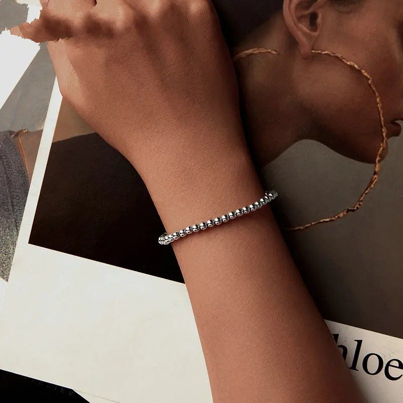 Stretchbares Perlenarmband aus Weißgold