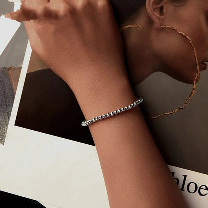Stretchbares Perlenarmband aus Weißgold